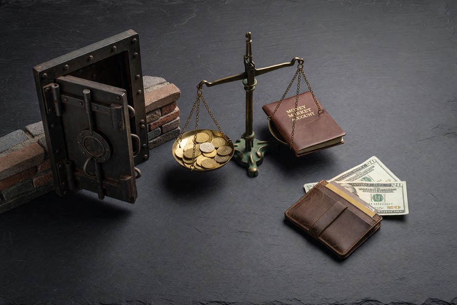 Side-by-side comparison chart of money market, savings, and checking account features