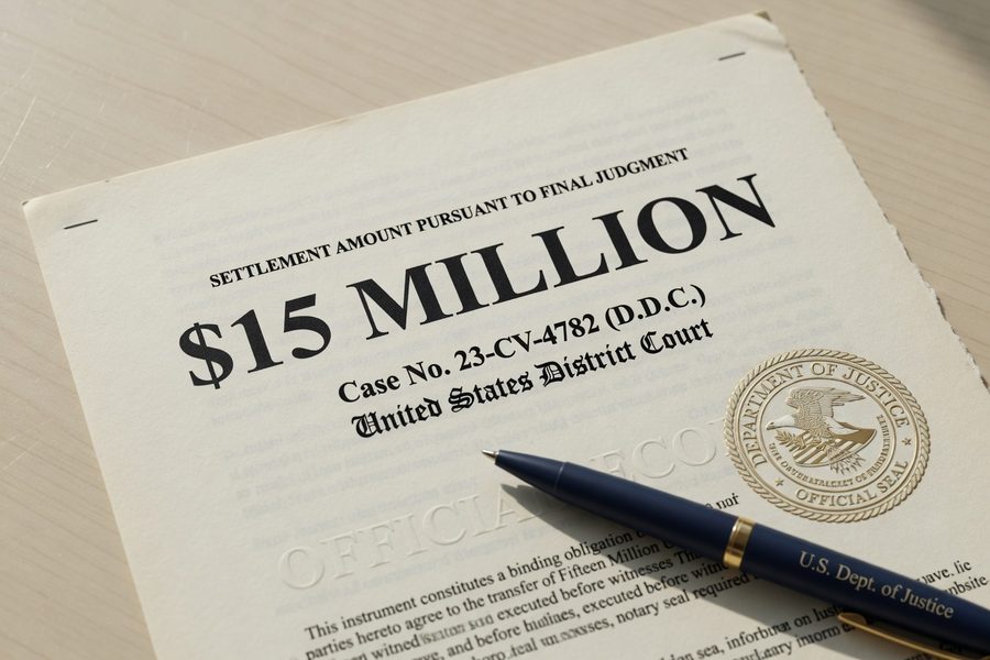 A financial advisor reviewing estate planning documents with a business owner couple