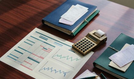 Financial spreadsheet showing cash flow projections across three prime rate scenarios for small business planning