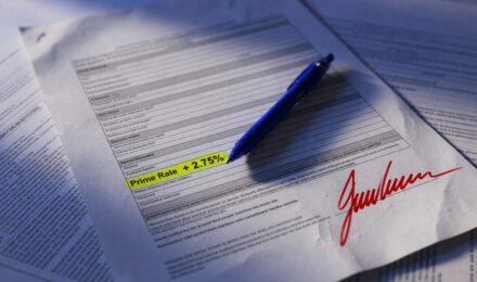 Comparison chart showing used-car loan interest rates versus prime rate in 2025