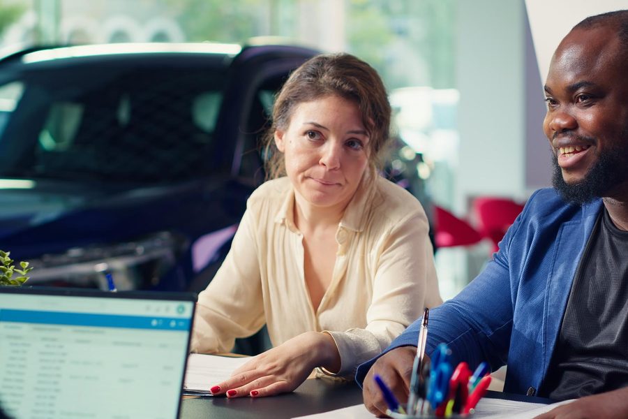 Comparison of direct lender rate versus dealer‑marked‑up rate on a typical used‑car loan.